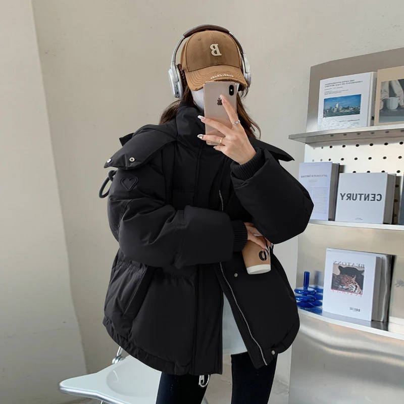 Damen nan oversized gesteppte Winterjacke mit Kapuze und Thermowattierung Nord Taschen