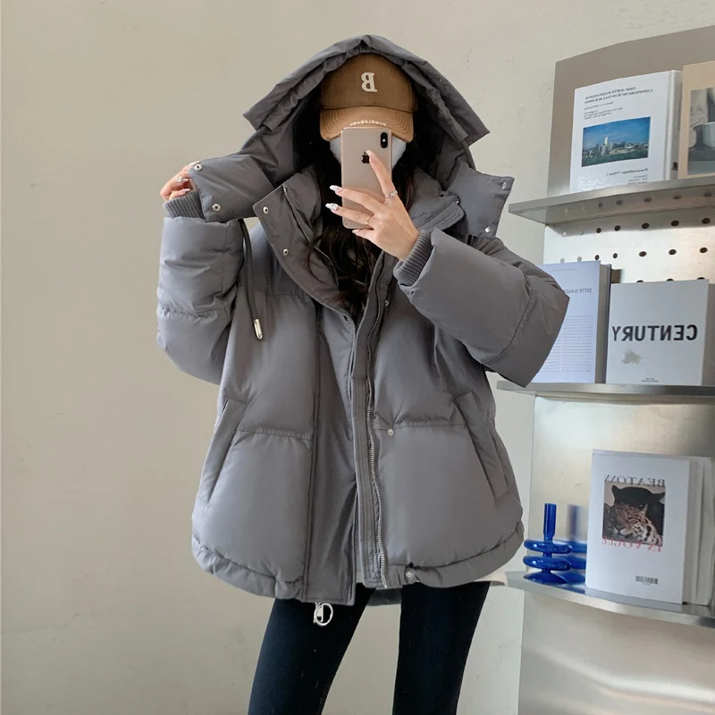Damen nan oversized gesteppte Winterjacke mit Kapuze und Thermowattierung Nord Taschen