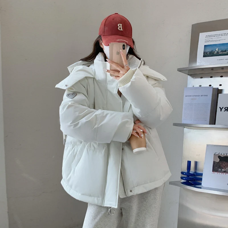 Damen nan oversized gesteppte Winterjacke mit Kapuze und Thermowattierung Nord Taschen