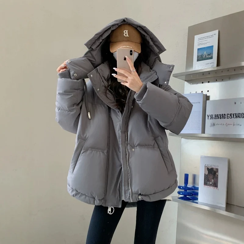 Damen nan oversized gesteppte Kurzjacke mit Kapuze, winddichter Fütterung und übergroßem Kragen Nord Taschen