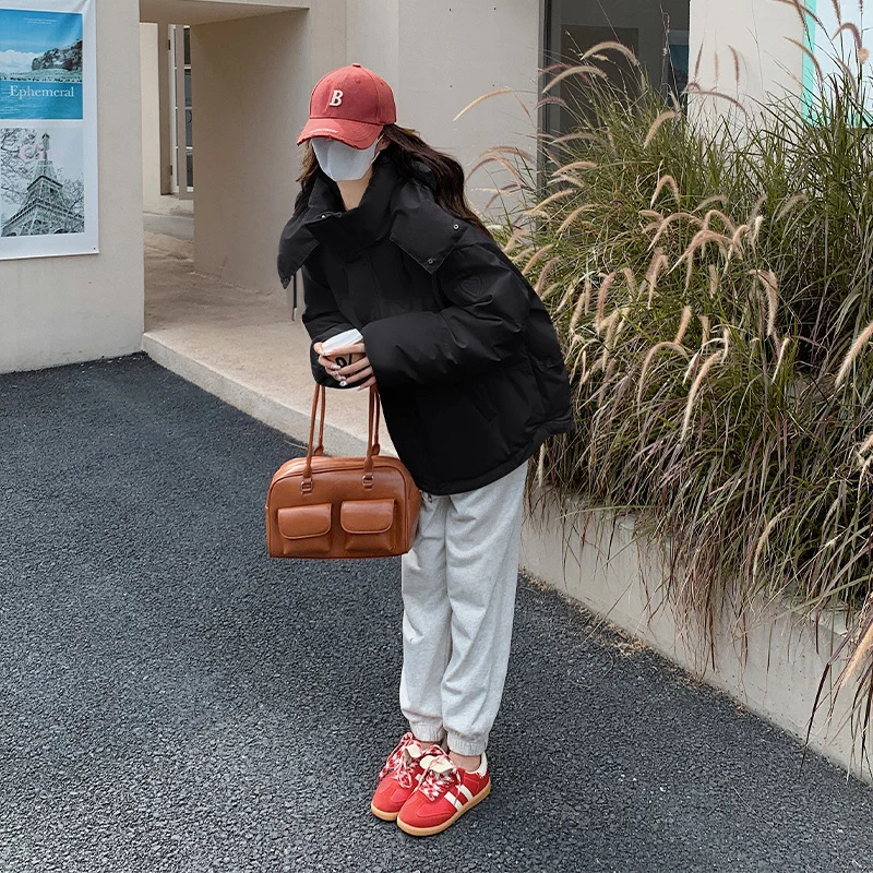 Damen nan leicht wattierte Oversize-Steppjacke mit Kapuze und verdecktem Reißverschluss Nord Taschen