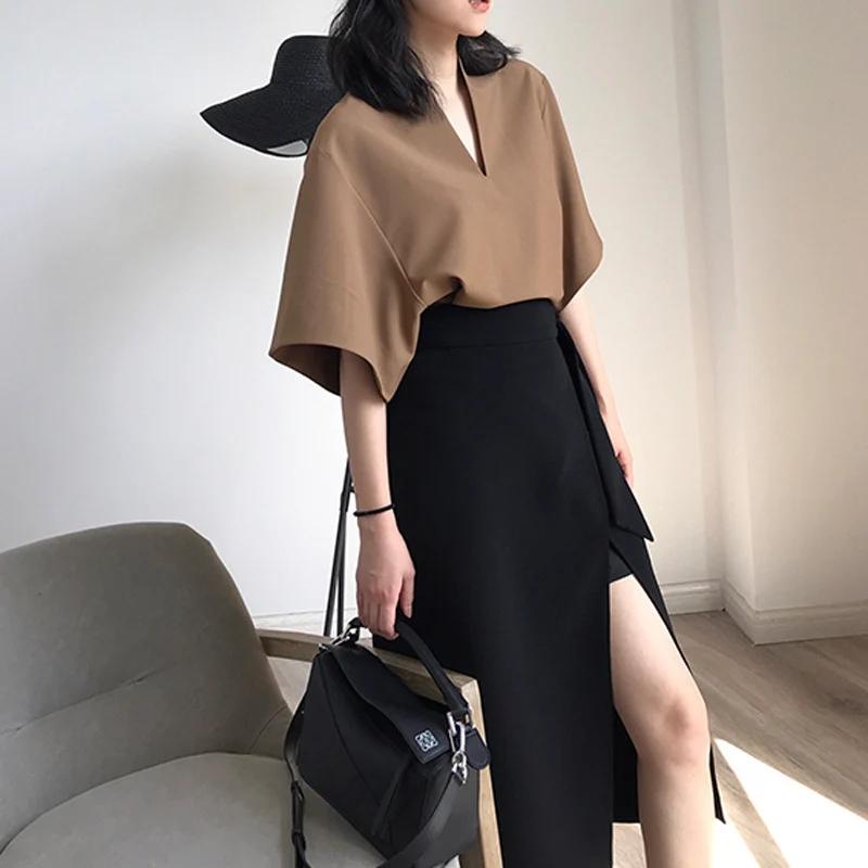 Damen Elegante Bluse mit V-Ausschnitt und weitem Schnitt Nord Taschen