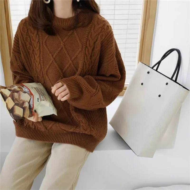 Damen Oversize Zopfmuster-Strickpullover mit Ajour‑Details und geripptem Saum Nord Taschen
