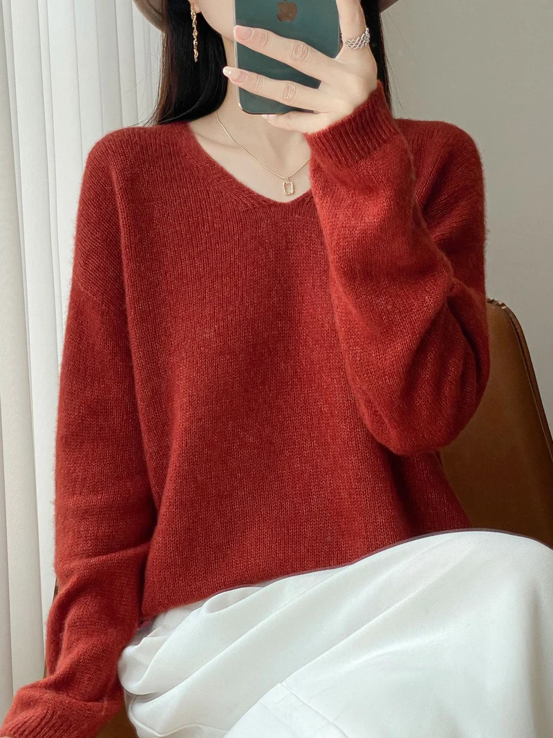 Damen Oversize-Feinstrickpullover mit feinem V-Ausschnitt und verlängertem Ärmelabschlusst Nord Taschen