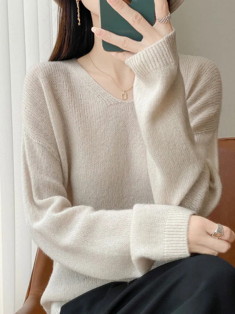 Damen Oversize-Feinstrickpullover mit feinem V-Ausschnitt und verlängertem Ärmelabschlusst Nord Taschen