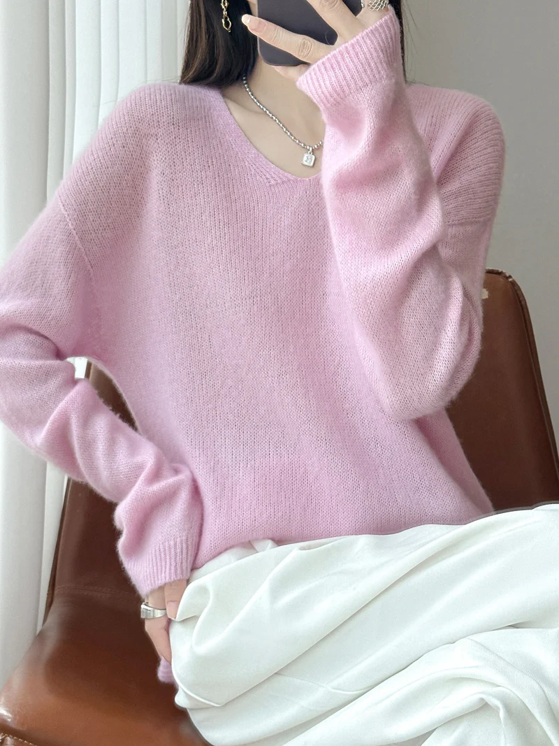 Damen Oversize-Feinstrickpullover mit feinem V-Ausschnitt und verlängertem Ärmelabschlusst Nord Taschen