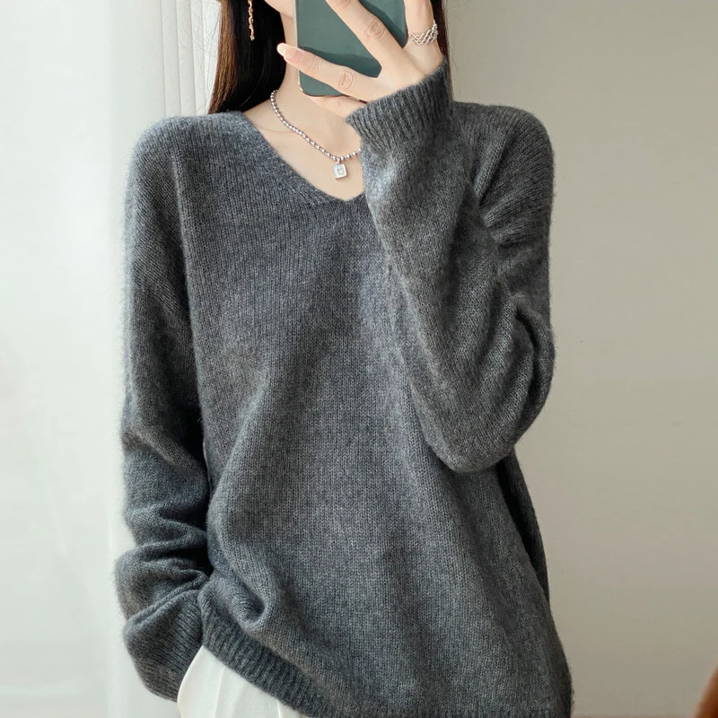 Damen Oversize-Feinstrickpullover mit feinem V-Ausschnitt und verlängertem Ärmelabschlusst Nord Taschen