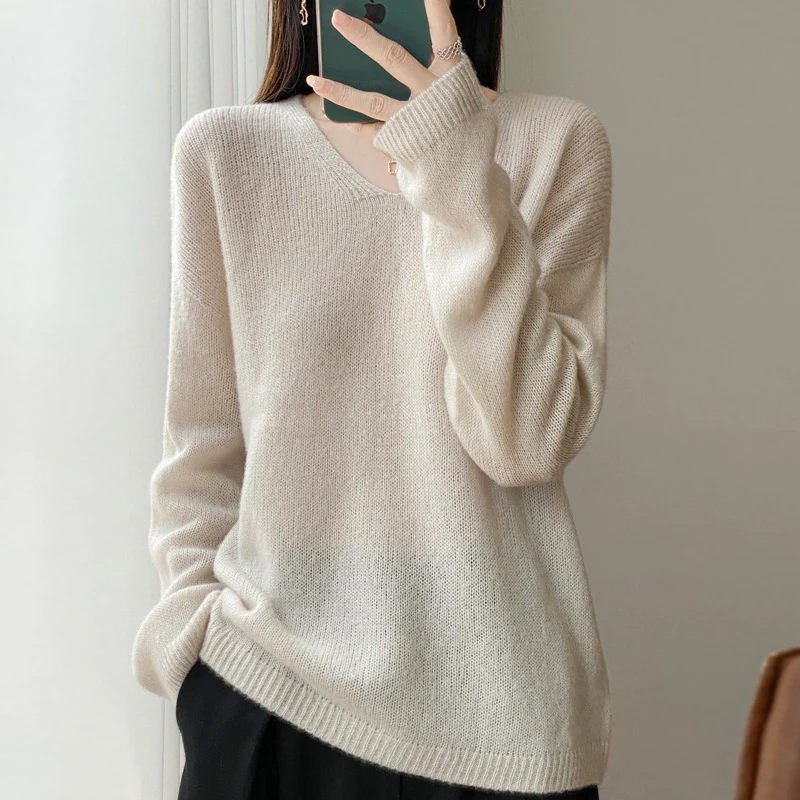 Damen Oversize-Feinstrickpullover mit feinem V-Ausschnitt und verlängertem Ärmelabschlusst Nord Taschen