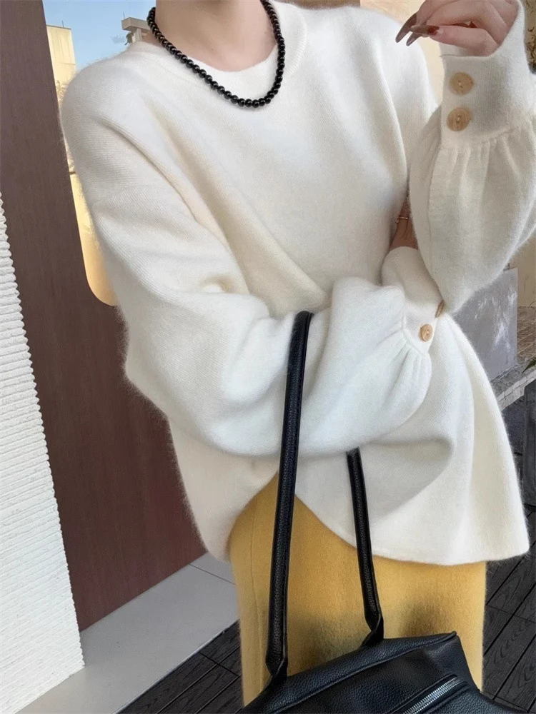 Damen Oversize-Feinstrickpullover mit Ballonärmeln und Knopfmanschette Nord Taschen