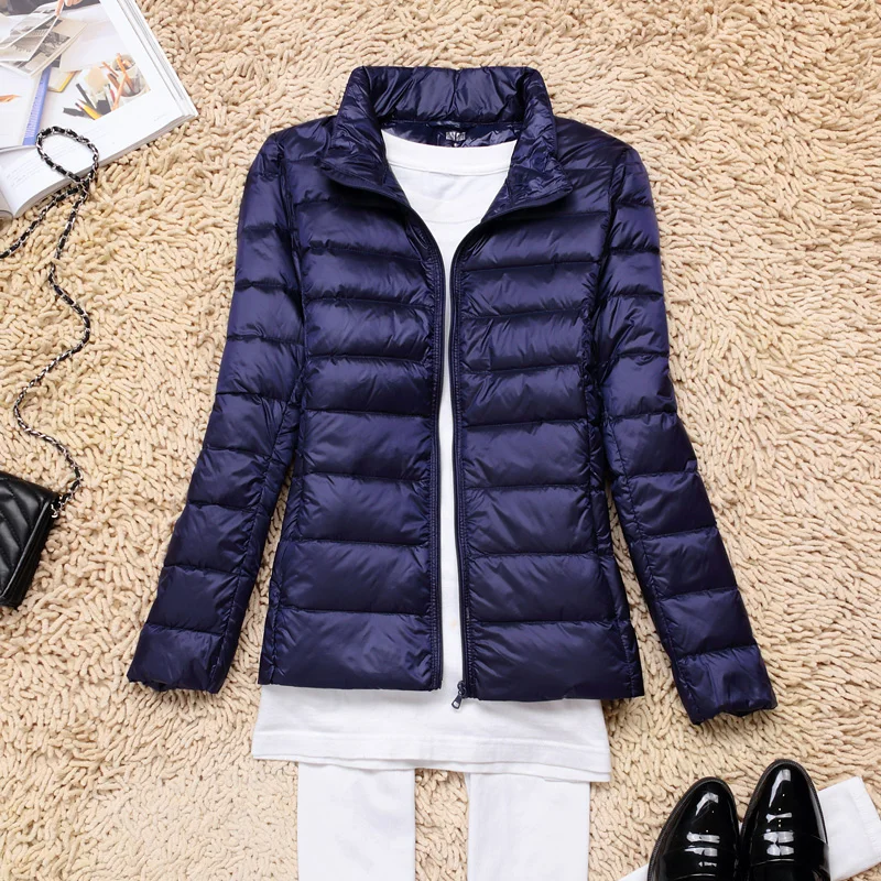 Nord Taschen | Ultraleichte Damen Daunenjacke mit Kapuze