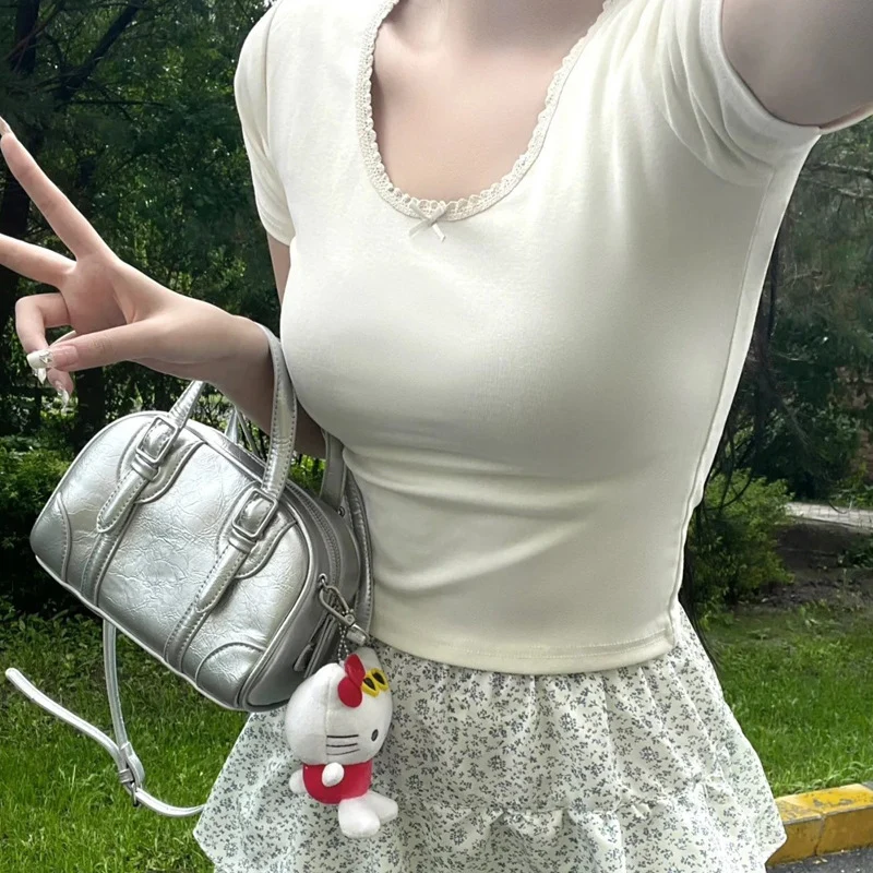 Damen Handtasche mit glänzender Oberflächenstruktur und elegantem Design Nord Taschen