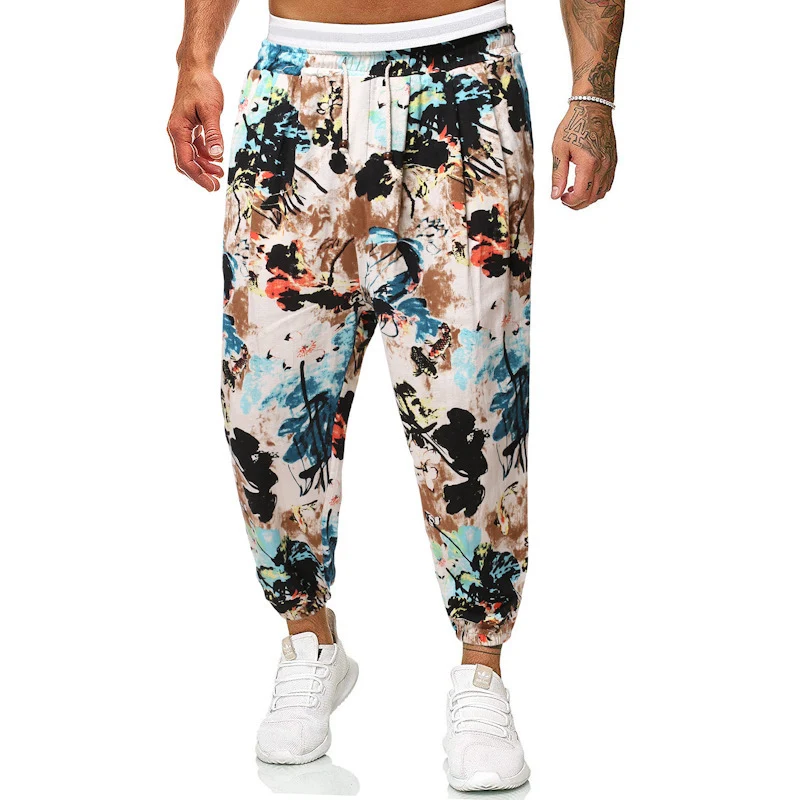 Herren Locker sitzende Patchwork-Loungehose mit Tunnelzug, elastischen Knöcheln und dekorativem Allover-Print Nord Taschen