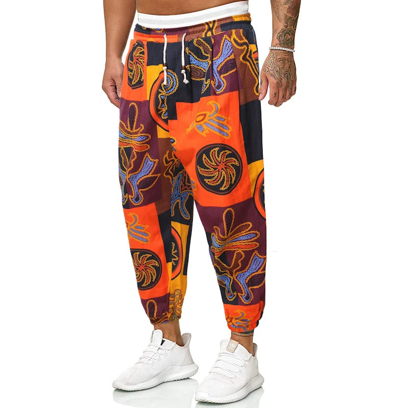 Herren Locker sitzende Patchwork-Loungehose mit Tunnelzug, elastischen Knöcheln und dekorativem Allover-Print Nord Taschen