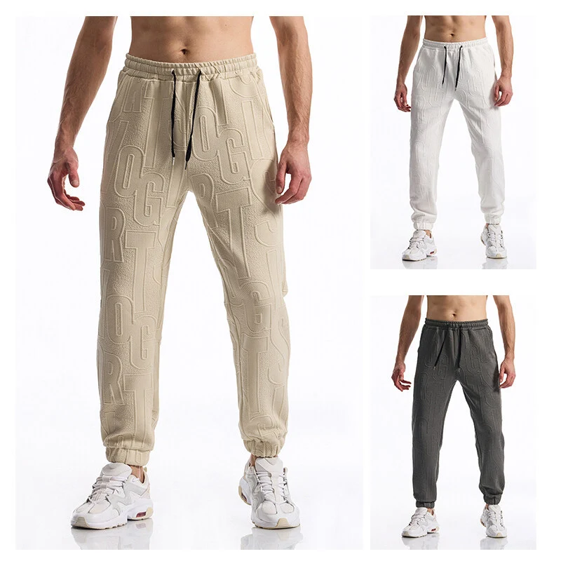 Herren Jogginghose mit elastischem Bund, Tunnelzug und geprägtem Allover‑Logo‑Relief Nord Taschen