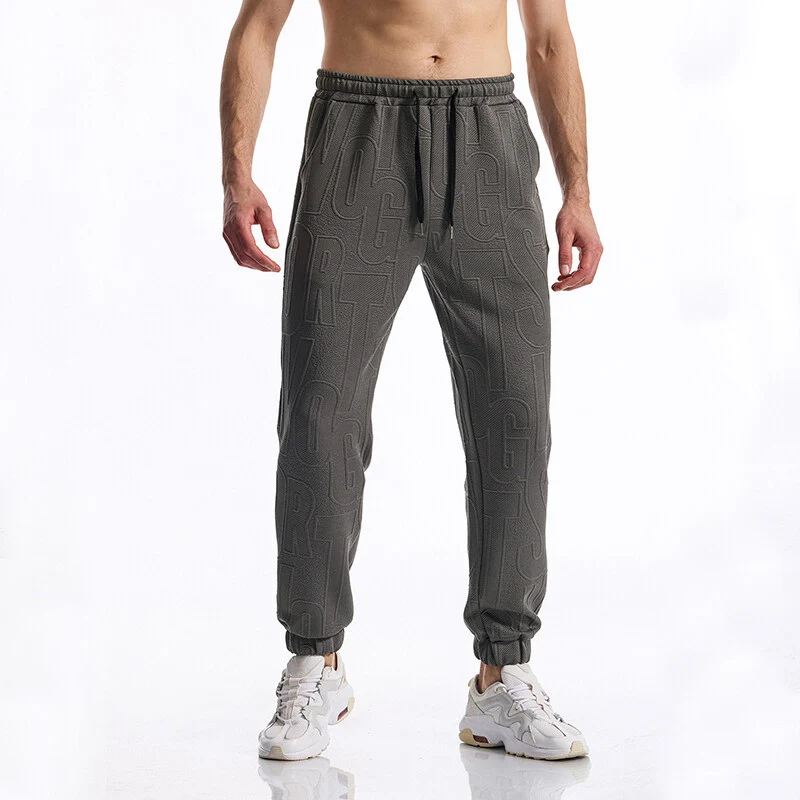 Herren Jogginghose mit elastischem Bund, Tunnelzug und geprägtem Allover‑Logo‑Relief Nord Taschen