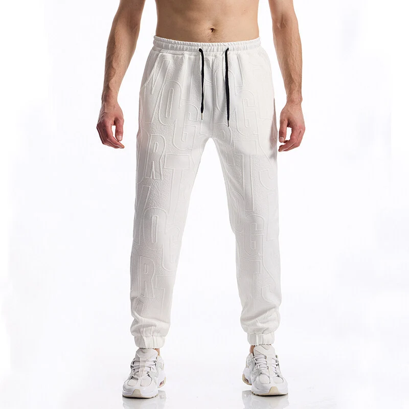 Herren Jogginghose mit elastischem Bund, Tunnelzug und geprägtem Allover‑Logo‑Relief Nord Taschen
