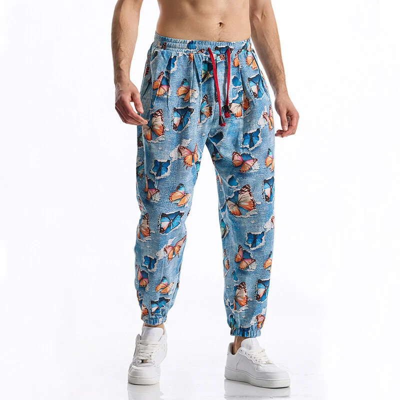 Herren Gemusterte Jogginghose im tapered Schnitt mit elastischem Bund und Tunnelzug Nord Taschen