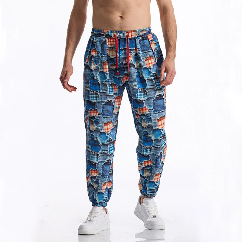 Herren Gemusterte Jogginghose im tapered Schnitt mit elastischem Bund und Tunnelzug Nord Taschen