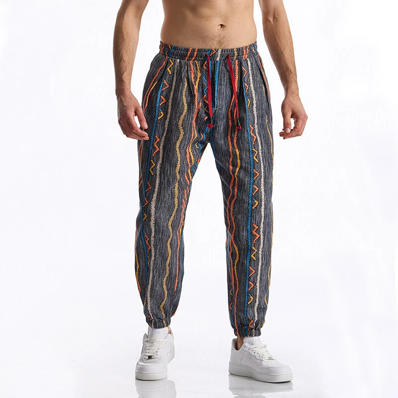 Herren Gemusterte Jogginghose im tapered Schnitt mit elastischem Bund und Tunnelzug Nord Taschen