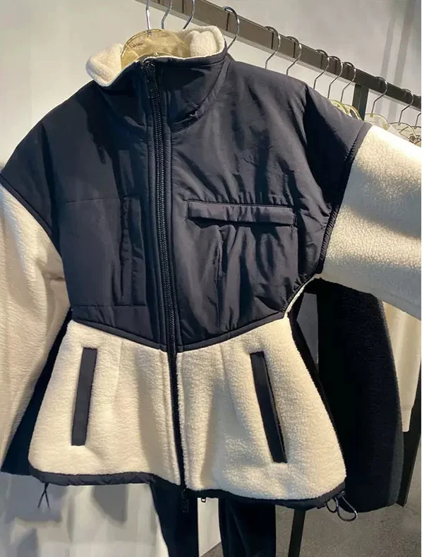 Damen Hybrid-Fleecejacke mit wattiertem Oberteil, Stehkragen und tailliertem Schößchen Nord Taschen
