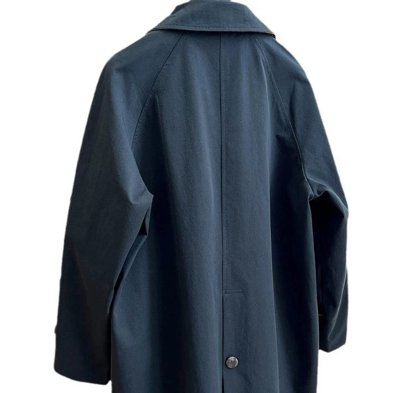 Damen Oversize-Trenchcoat mit Raglanärmeln, verdeckter Knopfleiste & verstellbaren Manschetten Nord Taschen