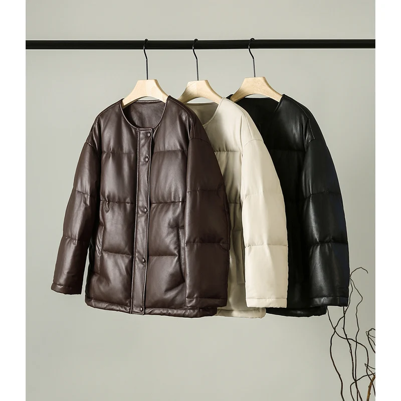 Damen Kurz geschnittene wattierte Kunstlederjacke mit Rundhalsaum und Druckknopfleiste Nord Taschen