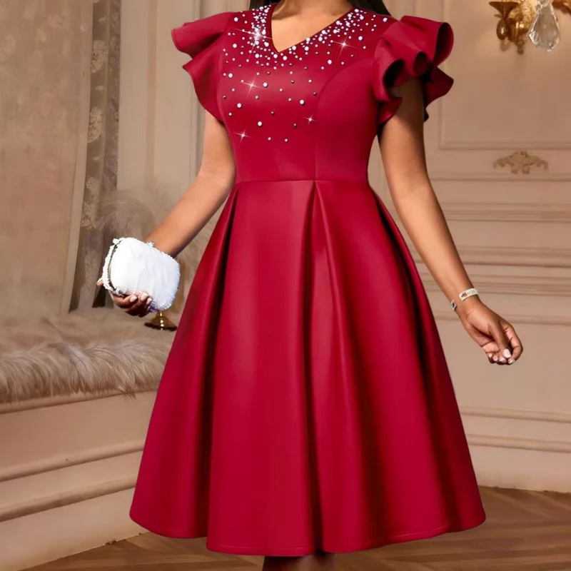 Damen A-Linien Kleid mit glitzernden Perlen und voluminösen Ärmeln