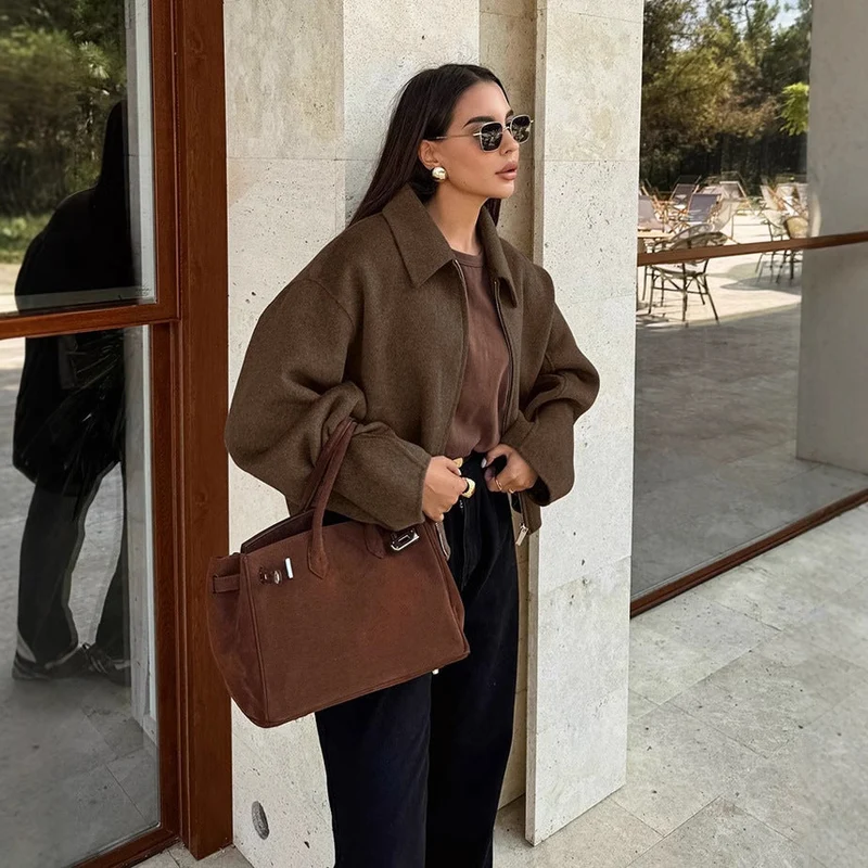 Damen Kapuzenjacke im Vintage-Stil mit oversized Schnitt und Reißverschluss