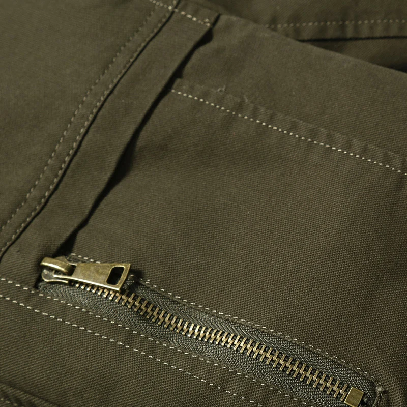 Herren Canvas-Fieldblouson im Pilotencut mit kariertem Innenfutter, Stehkragen und Rippbündchen Nord Taschen