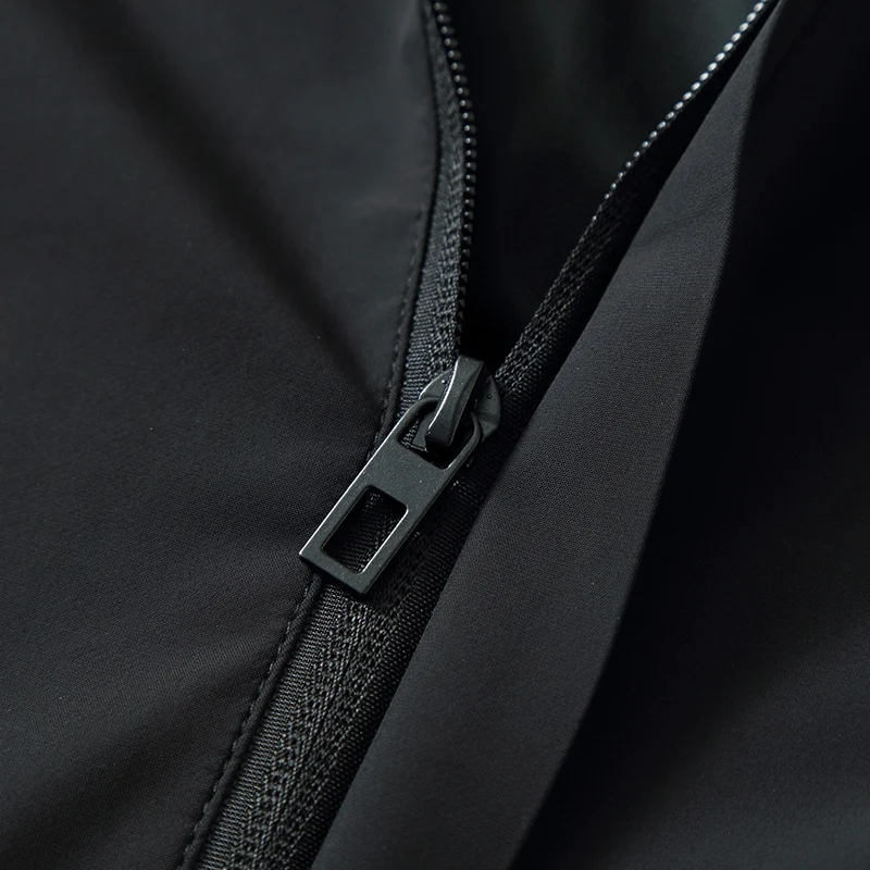 Herren Ultraleichte Wind- und Wasserabweisende Softshelljacke mit Kapuze, verdecktem Reißverschluss und elastischen Bündchen Nord Taschen