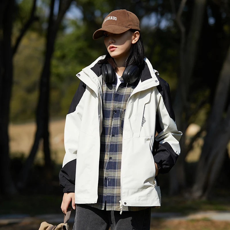 Damen zweilagige wasserabweisende Outdoorjacke mit Kapuze, Taillenregulierung und Kontrastbesätzen Nord Taschen