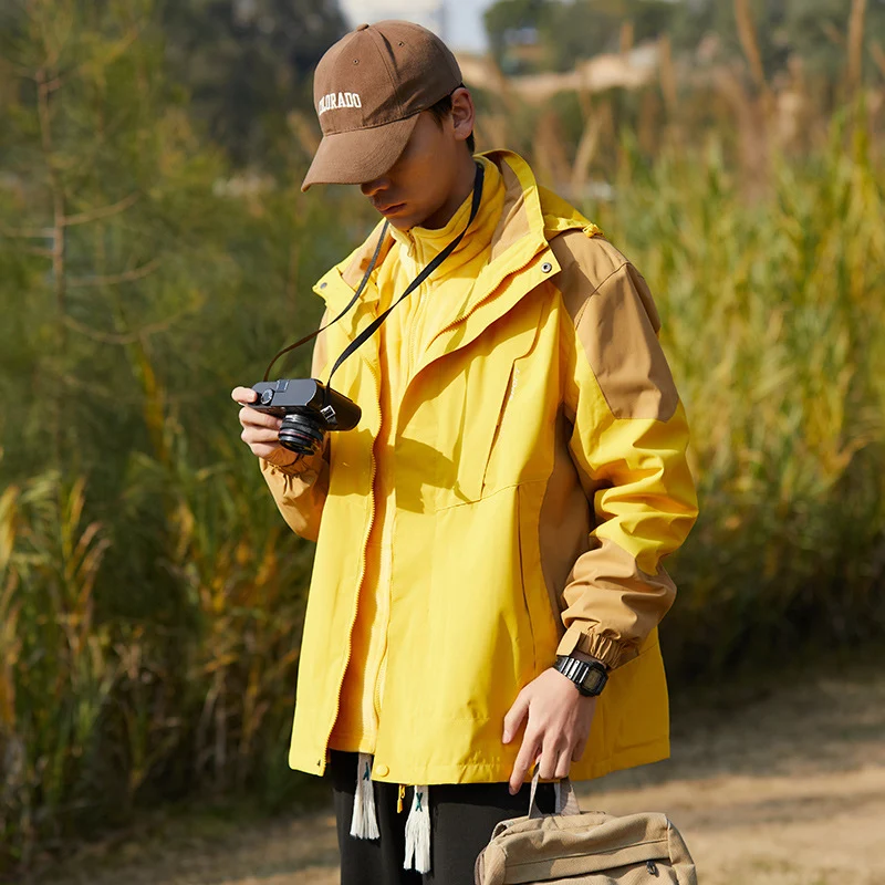 Damen zweilagige wasserabweisende Outdoorjacke mit Kapuze, Taillenregulierung und Kontrastbesätzen Nord Taschen
