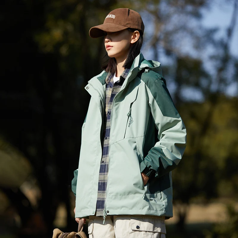 Damen zweilagige wasserabweisende Outdoorjacke mit Kapuze, Taillenregulierung und Kontrastbesätzen Nord Taschen