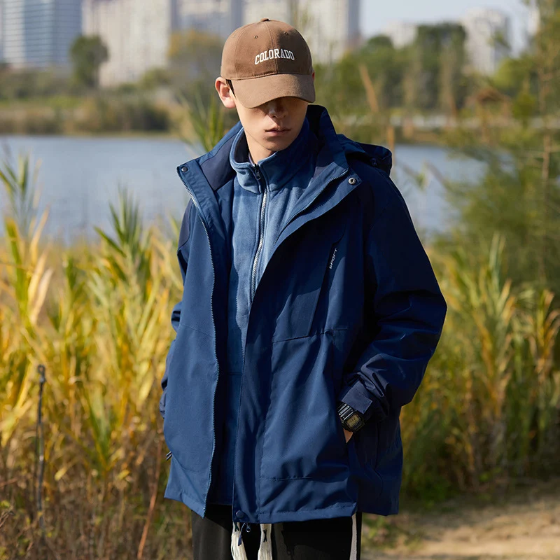 Damen zweilagige wasserabweisende Outdoorjacke mit Kapuze, Taillenregulierung und Kontrastbesätzen Nord Taschen