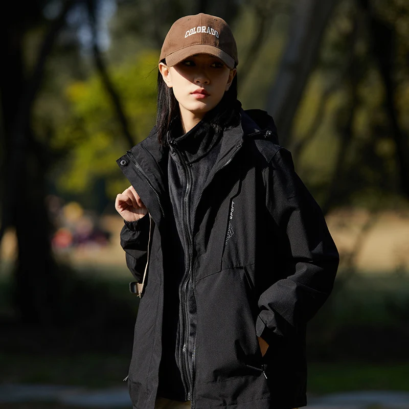 Damen zweilagige wasserabweisende Outdoorjacke mit Kapuze, Taillenregulierung und Kontrastbesätzen Nord Taschen