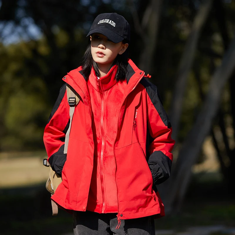 Damen zweilagige wasserabweisende Outdoorjacke mit Kapuze, Taillenregulierung und Kontrastbesätzen Nord Taschen