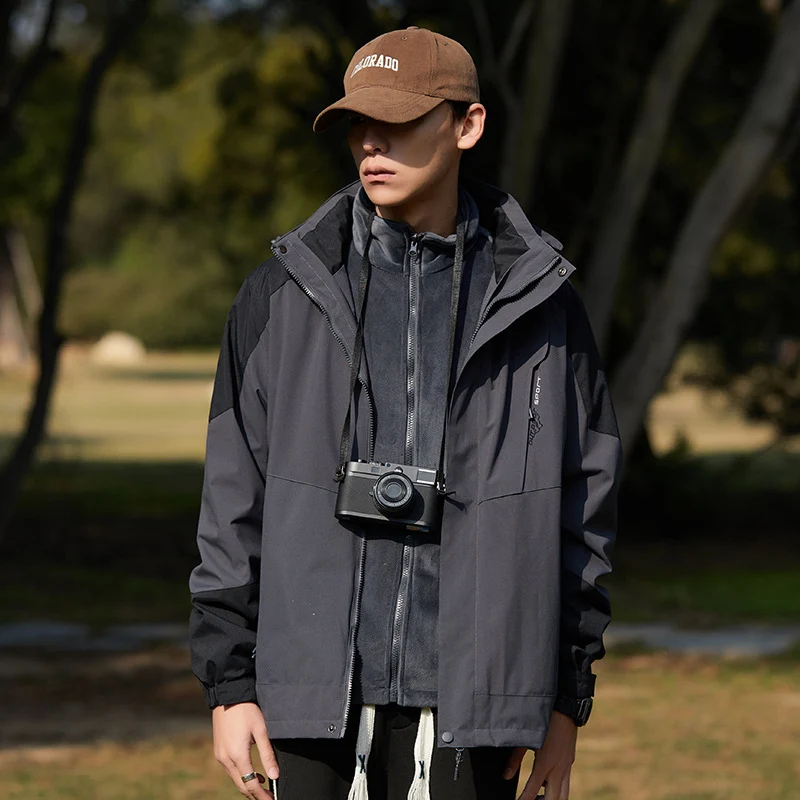 Damen zweilagige wasserabweisende Outdoorjacke mit Kapuze, Taillenregulierung und Kontrastbesätzen Nord Taschen