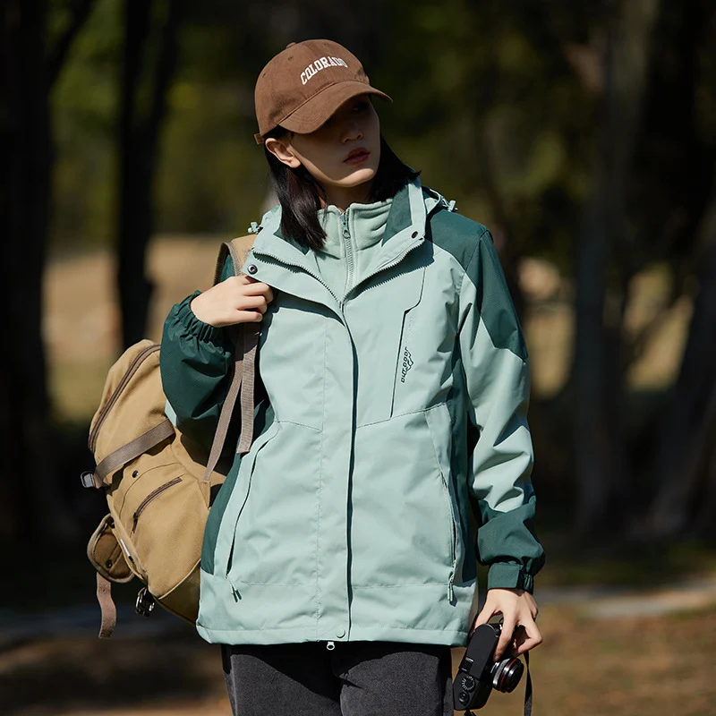 Damen zweilagige wasserabweisende Outdoorjacke mit Kapuze, Taillenregulierung und Kontrastbesätzen Nord Taschen