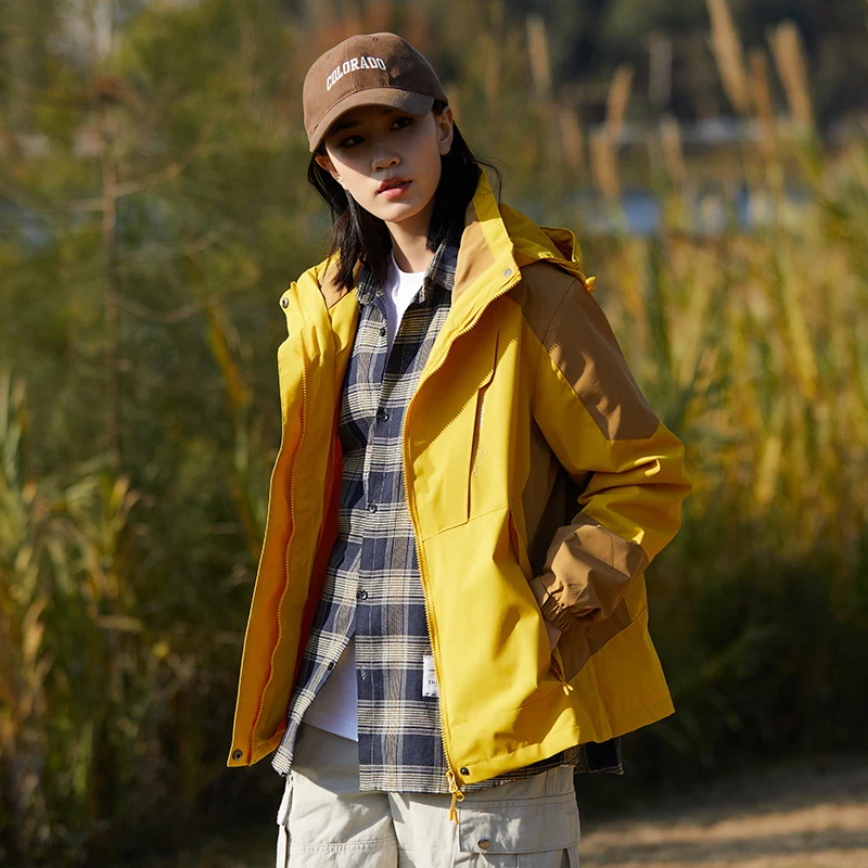 Damen zweilagige wasserabweisende Outdoorjacke mit Kapuze, Taillenregulierung und Kontrastbesätzen Nord Taschen