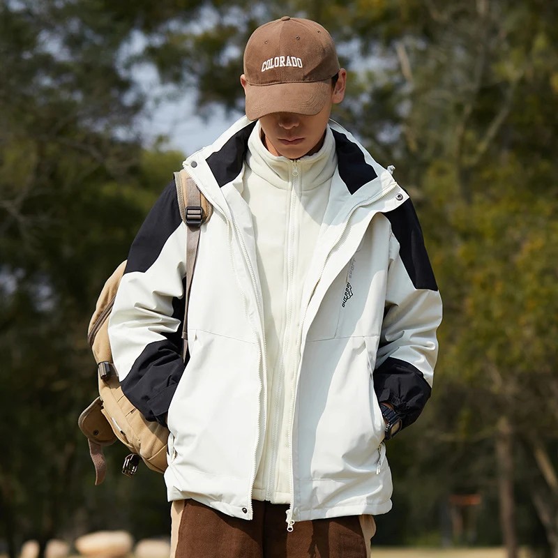 Damen zweilagige wasserabweisende Outdoorjacke mit Kapuze, Taillenregulierung und Kontrastbesätzen Nord Taschen
