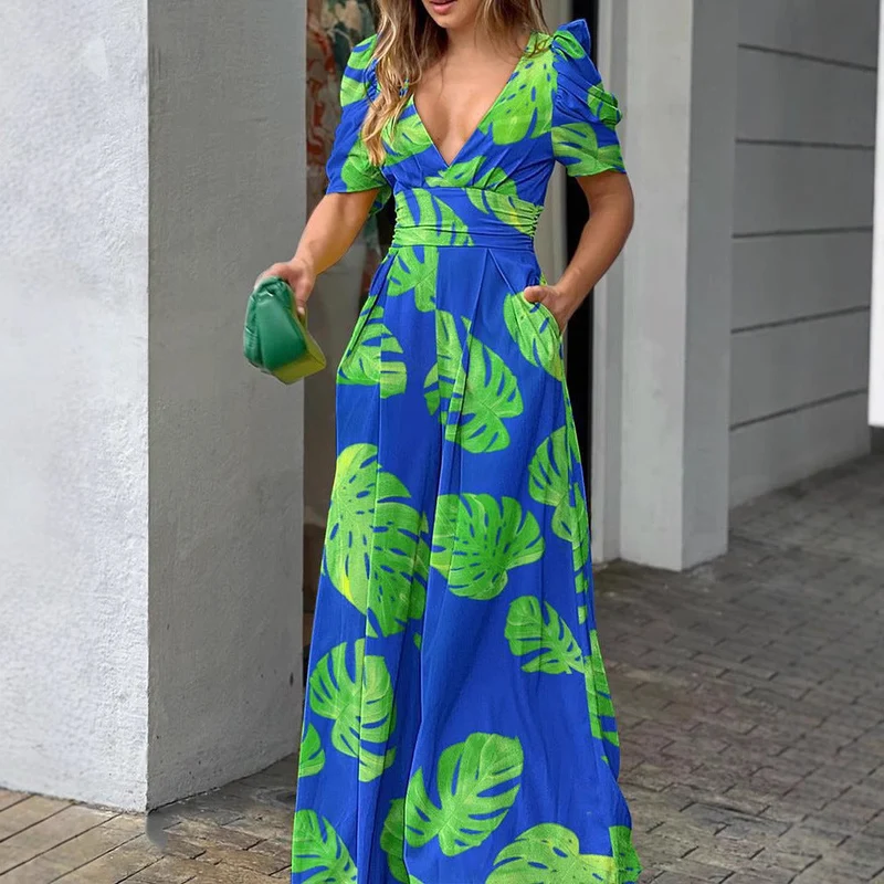 Damen Sommerliches Maxikleid mit voluminösen Puffärmeln und seitlichen Taschen Nord Taschen
