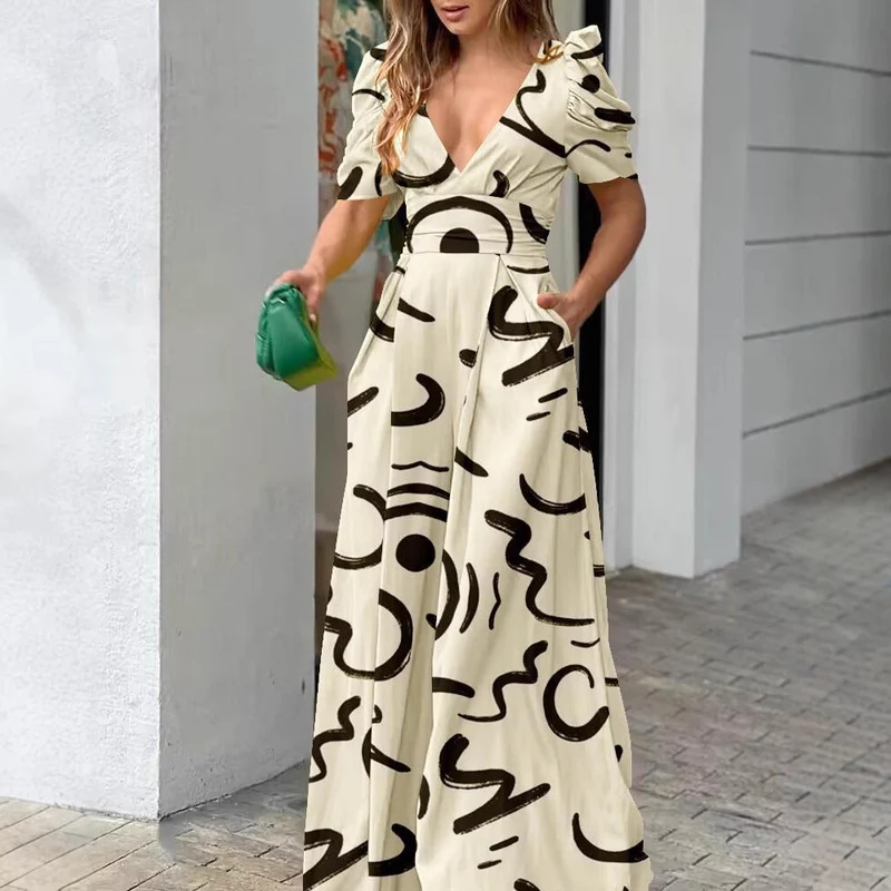 Damen Sommerliches Maxikleid mit voluminösen Puffärmeln und seitlichen Taschen Nord Taschen