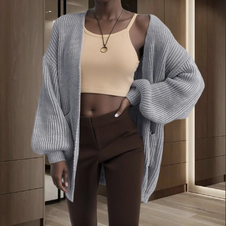 Damen Großer Strickjacke mit voluminösen Ärmeln und praktischen Taschen