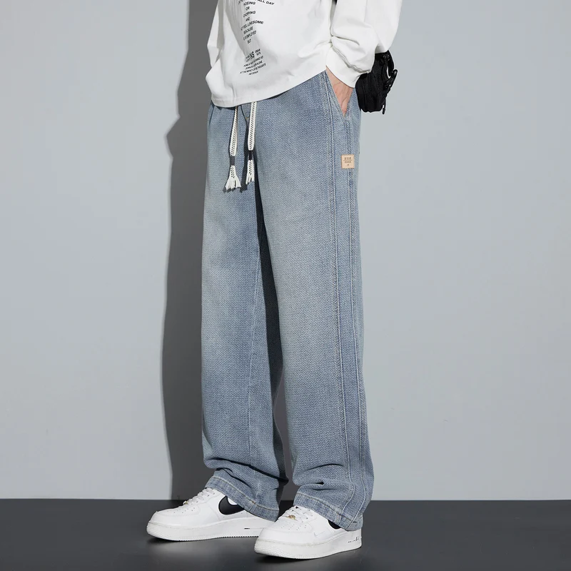 Herren Weite Denim-Jogginghose mit geflochtenem Kordelzug und Fischgrätstruktur Nord Taschen