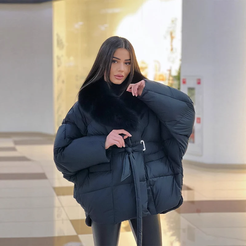 Damen Oversize Steppjacke mit Taillengürtel und Kunstfellkragen Nord Taschen