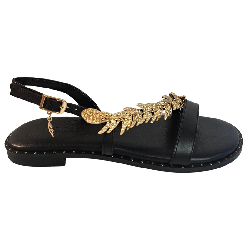 Caryatis, Sandale mit goldfarbenem Zierschmuck in Schwarz