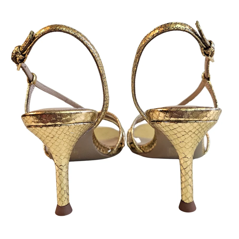 Lola Cruz, geprägte Riemchensandalette in Gold