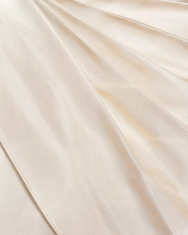 Asymmetrisches Cape-Oberteil mit hohem Kragen und Drapierung - Creme