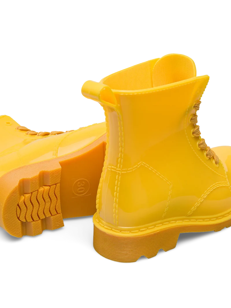 Lustige goldgelbe Regenstiefel für Kinder