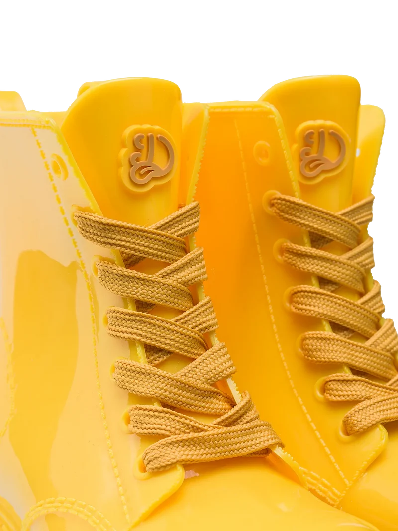 Lustige goldgelbe Regenstiefel für Kinder